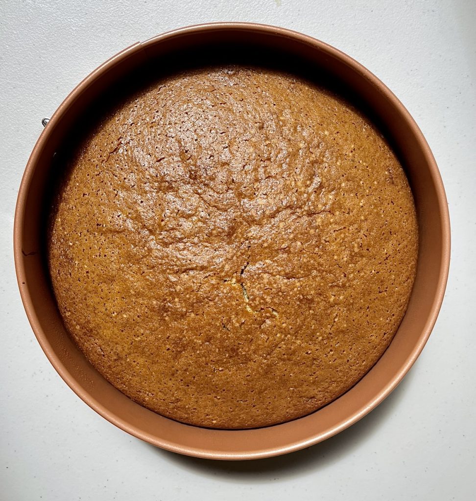 Basil olive oil cake right out of the oven. Golden brown on top!