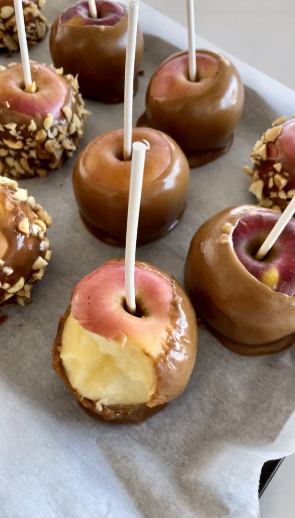classic caramel apples with nuts have the perfect chewy and rich exterior.