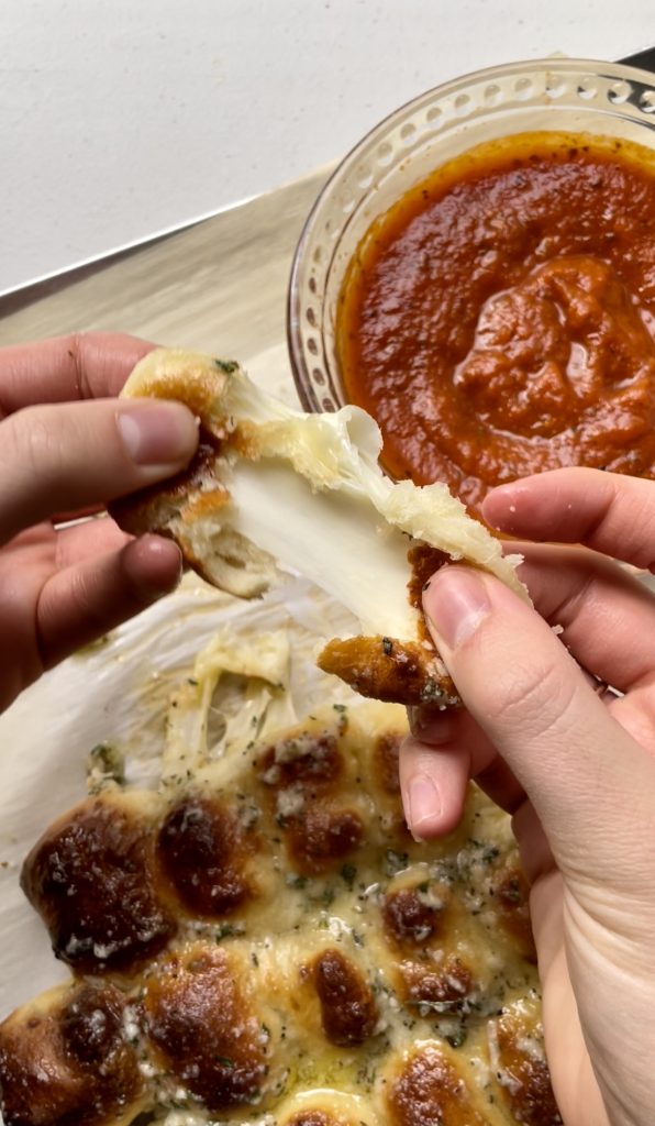 This pull-apart bread is best enjoyed warm while the cheese is still melty.