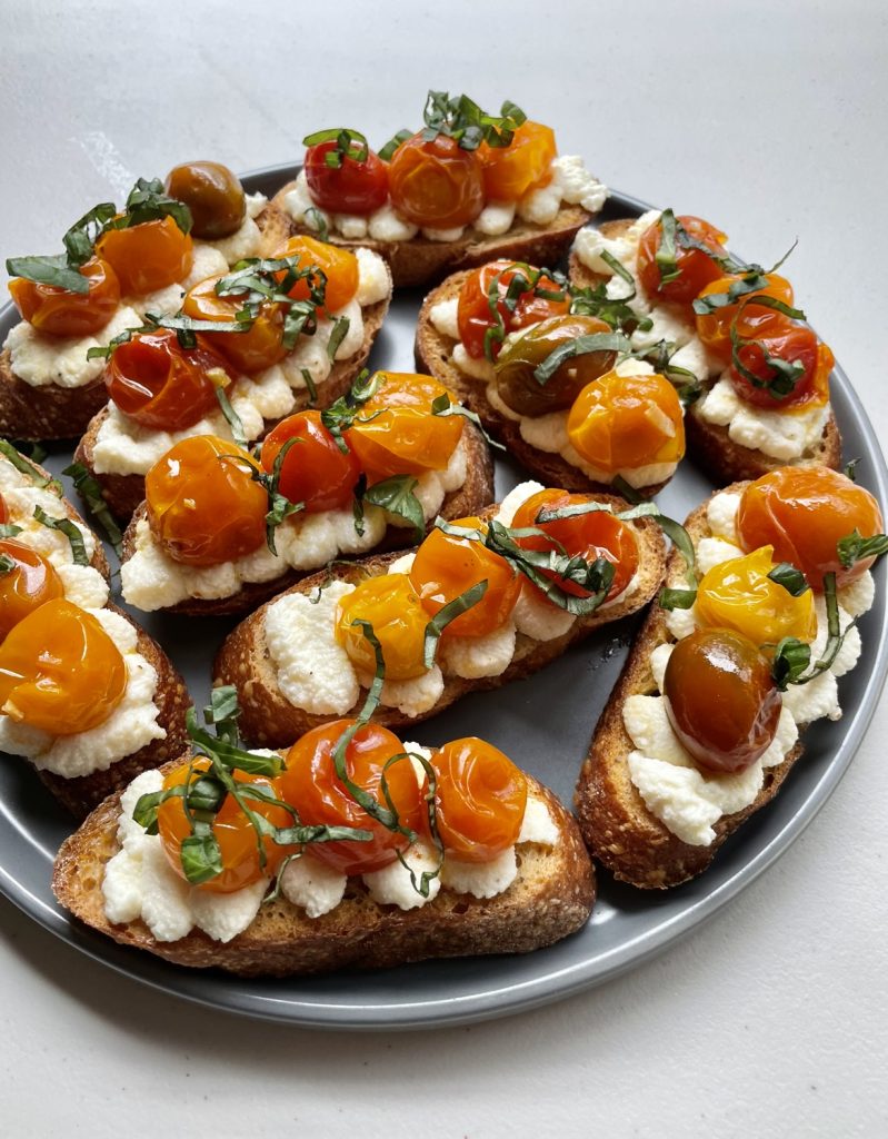The sprinkle of fresh basil on each crostini adds so much flavor!