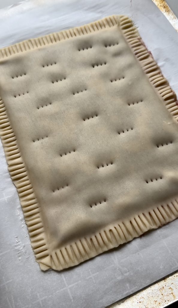 Don't forget to dock the surface of the pie crust before baking! 