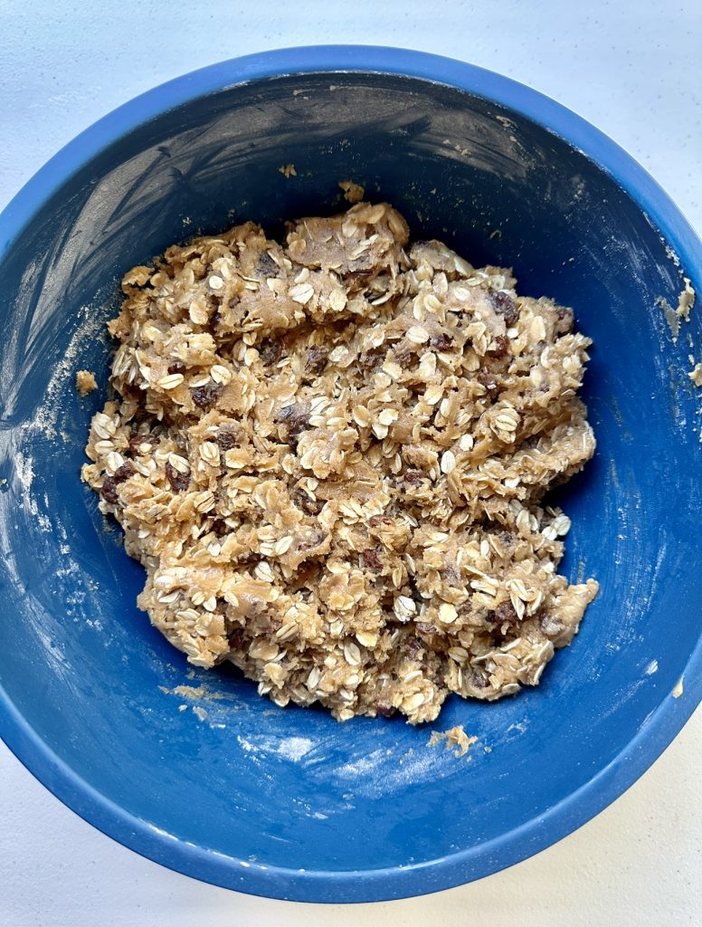 Chilling the cookie dough helps the cookies have a chewy interior with crisp edges because the flour and oats have time to hydrate.