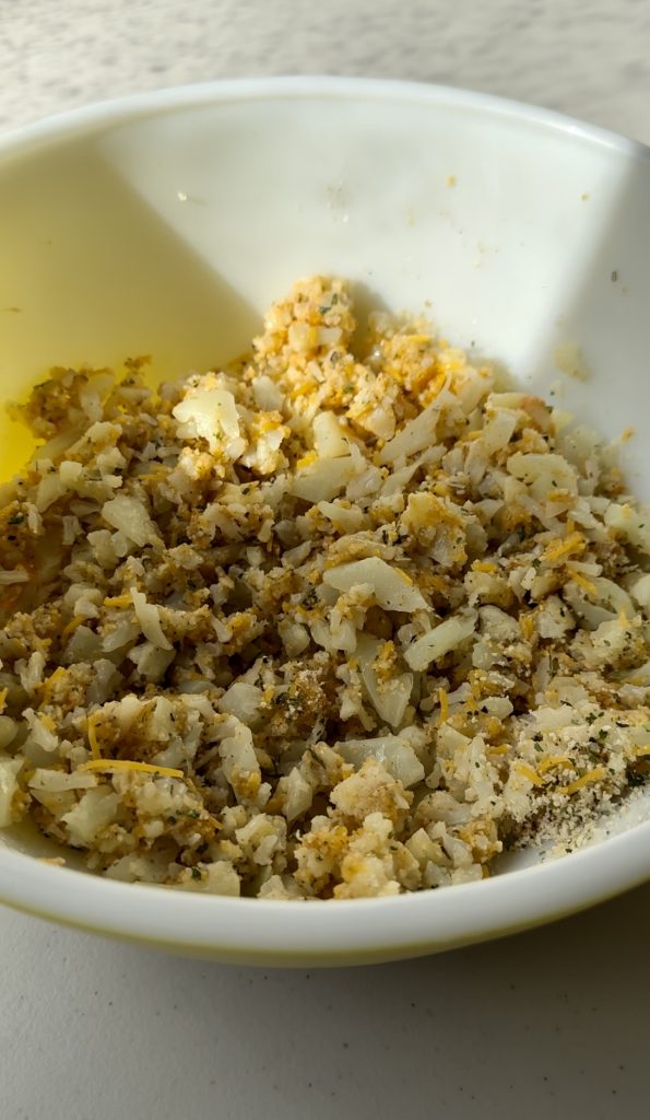 You'll want the cheesy cauliflower mixture to me well combined before forming them into patties.