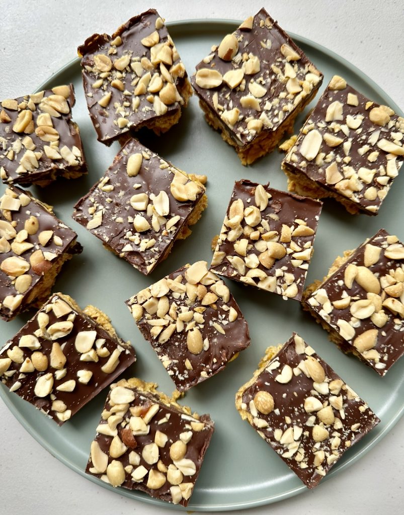 Peanut butter cornflake slices are crunchy, chewy and full of peanut butter and chocolate flavor!
