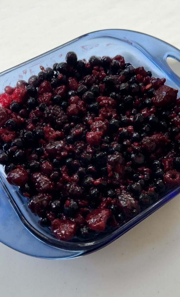 Fresh or frozen berries will both work for this dessert. The most important thing is making sure there is enough flour added to thicken the juices from the berries.