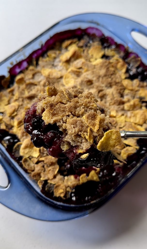 Cornflake berry crisp will need to cool at least halfway before serving. This will give the fruit filling the time it needs to thicken.