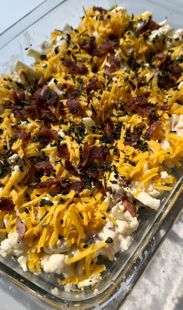 Topping this loaded cauliflower bake with extra cheese and bacon before baking makes it even more decent and delicious!